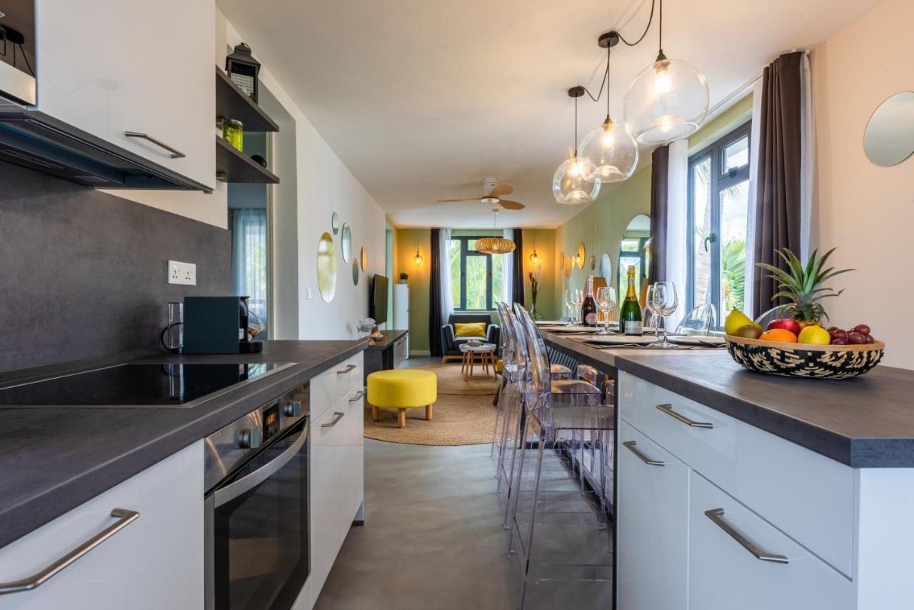 Les Cerisiers Residence: Cozy Beachfront With Modern Amenities Apartment Flic en Flac